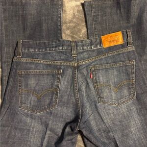 Levi’s Denim 553 mid rise boot cut pressed by Cleaners. Ready for new owner
